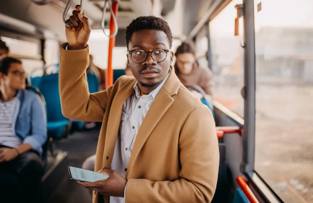 Business man travelling by bus