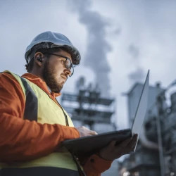 Engineer using a laptop while working