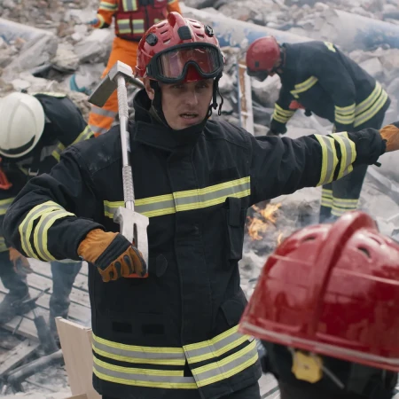 Men speaking  to team during rescue mission